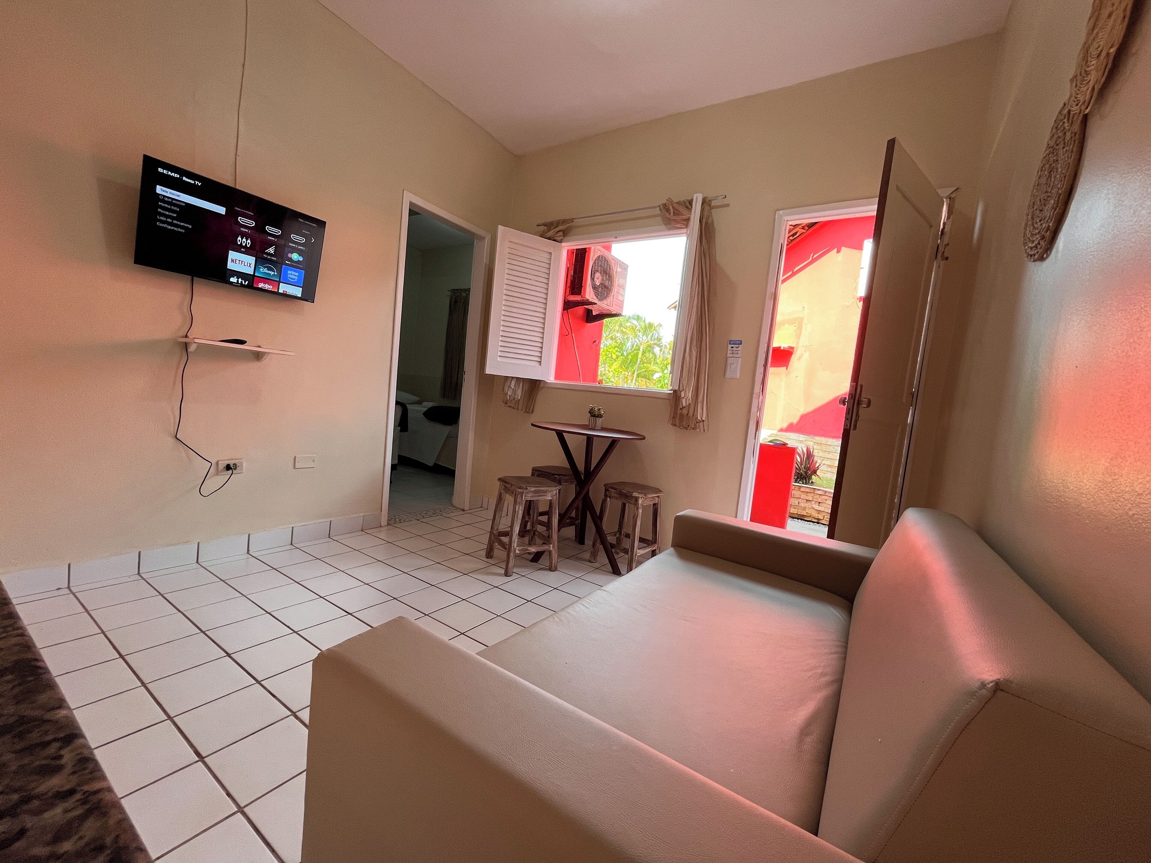 family room, kitchen, garden view | 1 bedroom, minibar, individually decorated, individually furnished