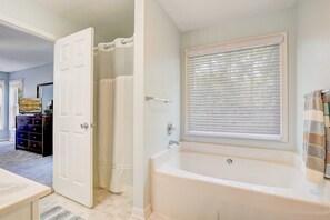 Combined shower/tub, hair dryer, towels, soap