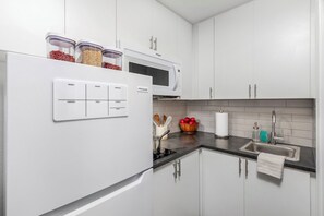 Premium Room, 1 Queen Bed | Private kitchen | Dining tables - InTown Suites Extended Stay Atlanta GA - Norcross (Norcross)