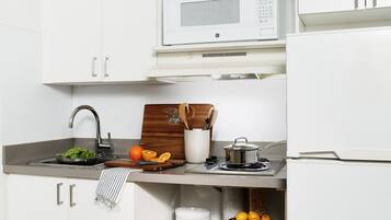 Deluxe Studio, 2 Double Beds, Kitchen | Private kitchen | Fridge, microwave, stovetop, freezer