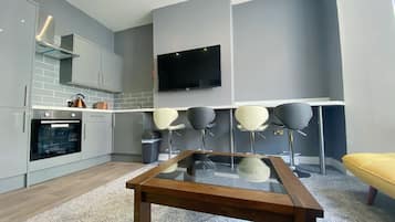 Apartamento, suíte | Lounge