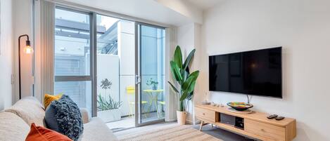 Apartment | Living area | 42-inch TV with cable channels, Netflix, streaming services