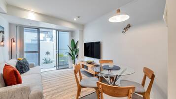 Apartment | Living area | 42-inch TV with cable channels, Netflix, streaming services