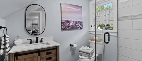 Combined shower/tub, toilet paper