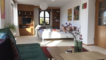 Apartment, Ground Floor | Living area | 32-inch TV with satellite channels