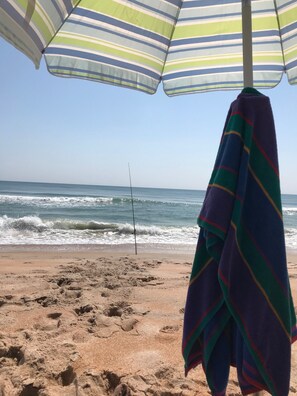 On the beach, sun-loungers, beach towels