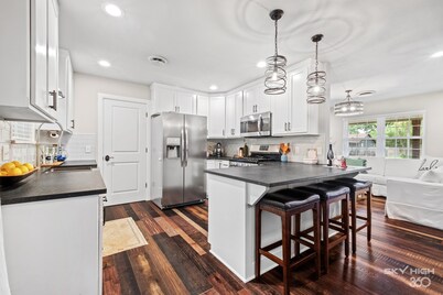 the ORANGE DOOR just steps from art, trails & dining