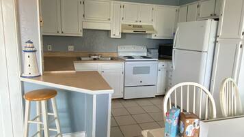 Coffee/tea maker, microwave, dishwasher, cookware/dishes/utensils