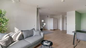 Suite XXL + sofa bed | Living area | 55-inch Smart TV with digital channels, TV