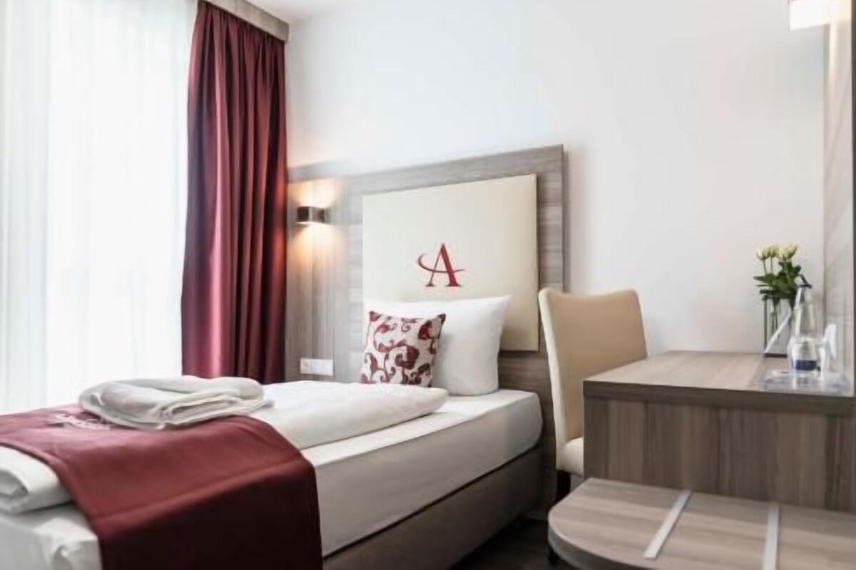 Hypo-allergenic bedding available, in-room safe, desk, laptop workspace