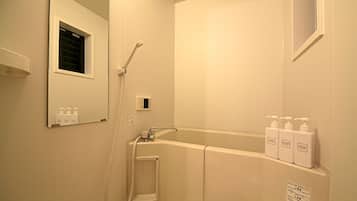A whole house plan, Non Smoking | Bathroom | Separate tub and shower, free toiletries, hair dryer, bidet