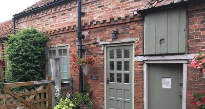 Quaint cottage with all modern conveniences in quiet village location