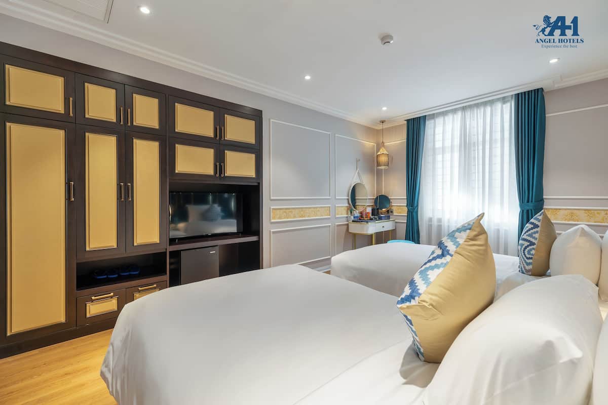 Ropa de cama de alta calidad, minibar y escritorio