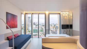 Deluxe Room, City View (1 King Bed) | Minibar, in-room safe, desk, laptop workspace