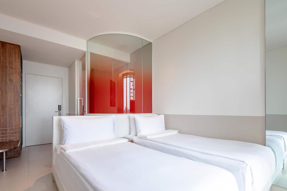 Basic Room, 2 Single Beds | Minibar, in-room safe, desk, laptop workspace