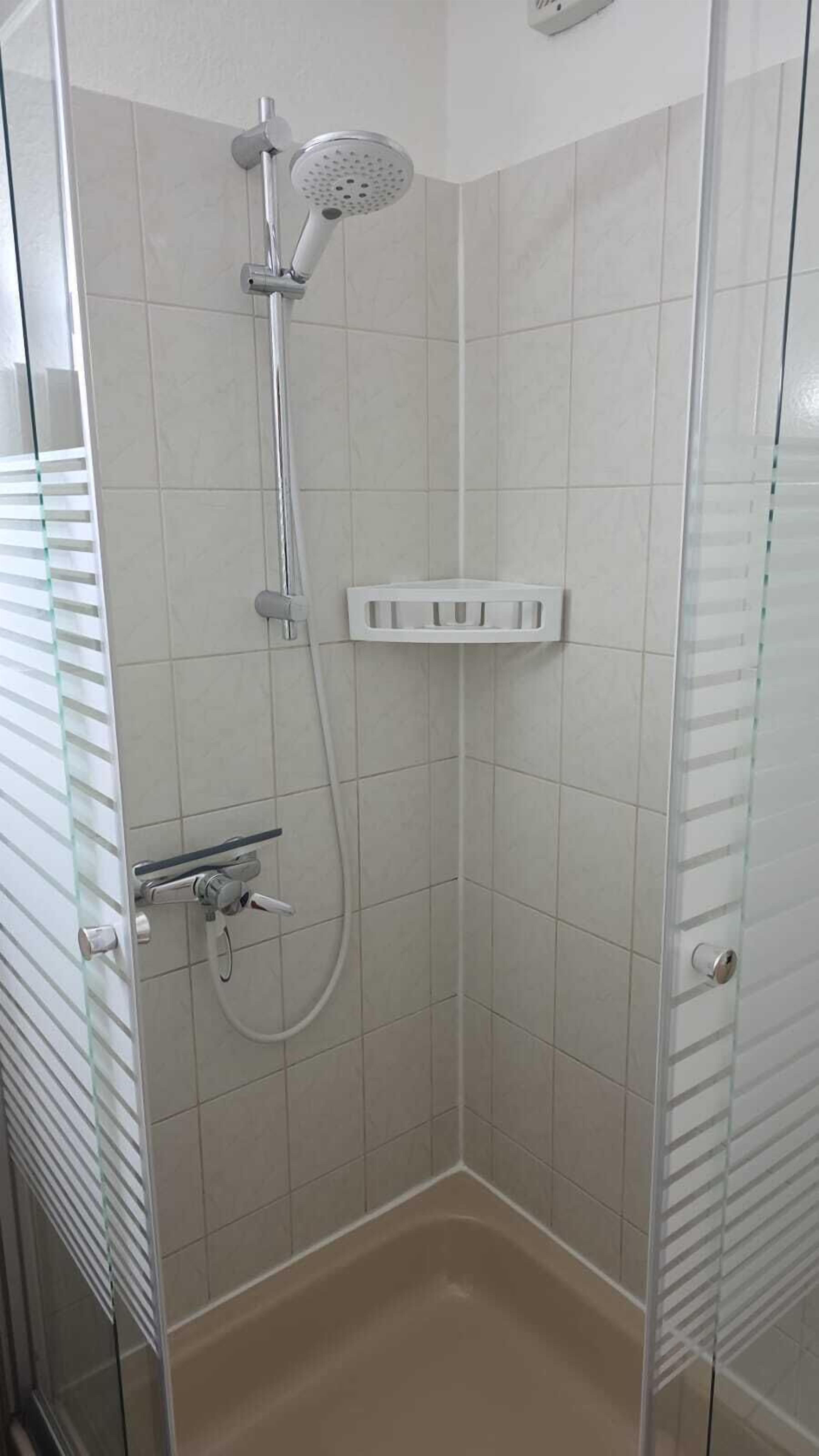 shower, hydromassage showerhead, eco-friendly toiletries, hair dryer