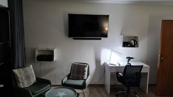 42-inch Smart TV with satellite channels, TV, Netflix