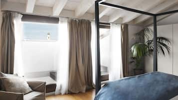 Family Suite | Down duvets, minibar, in-room safe, iron/ironing board