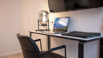 40-inch flat-screen TV with digital channels, TV, pay films