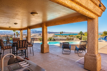Outdoor dining. Lake View Resort compound-6 bedrooms-2 casitas -pool house- pool & spa