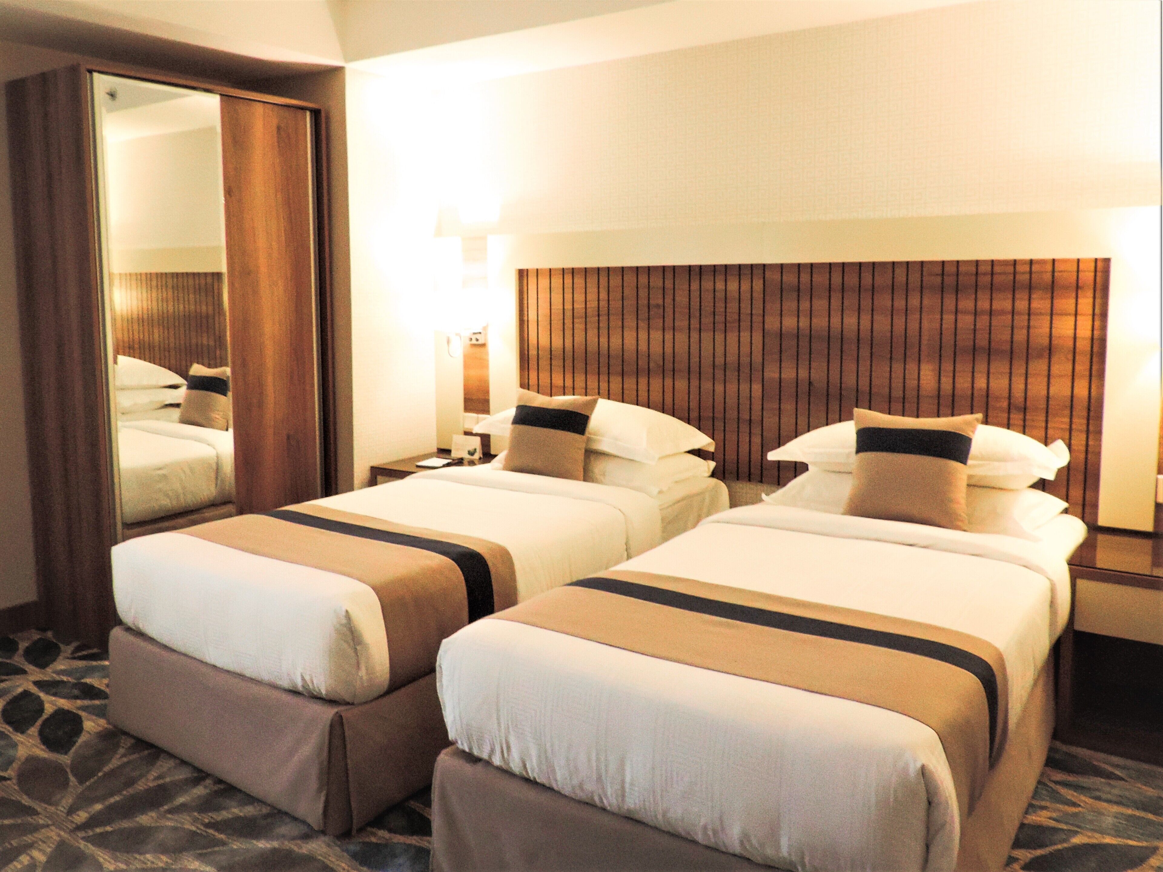 executive suite, 2 bedrooms, city view | 1 bedroom, premium bedding, minibar, in-room safe