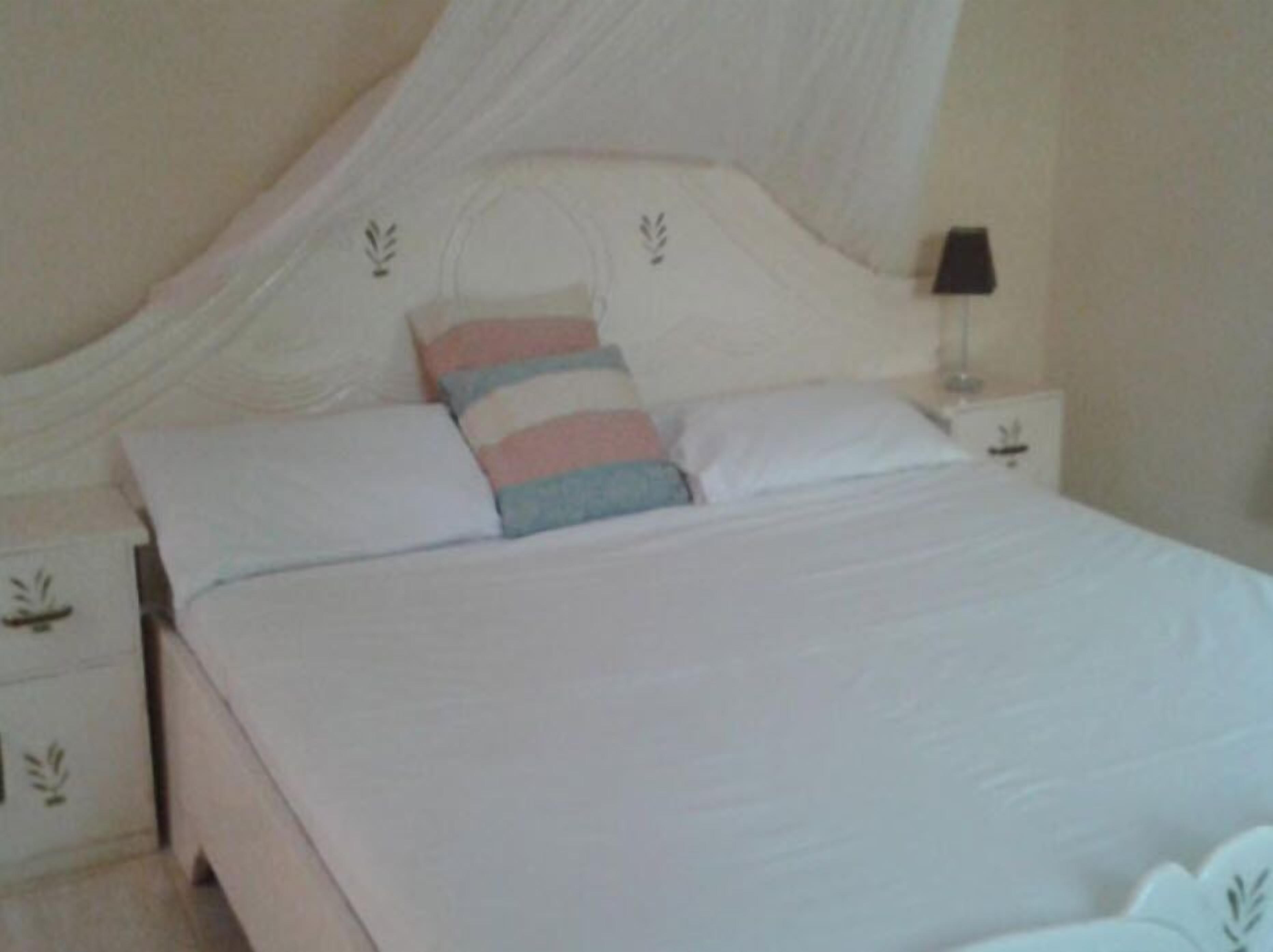 Phòng Suite, quang cảnh vườn | Bàn ủi/dụng cụ ủi quần áo, bộ trải giường 