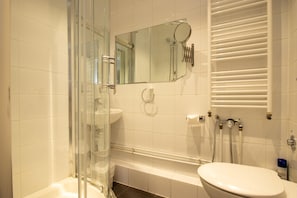 Bathtub, hair dryer, towels