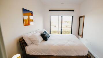 1 bedroom, desk, iron/ironing board, travel crib