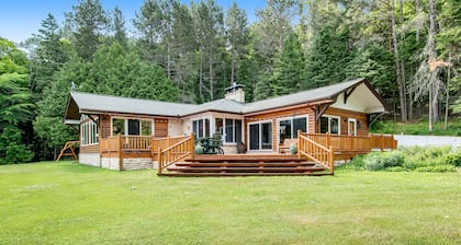 Dog-friendly and secluded lakefront gem with a full bar, private dock, and views