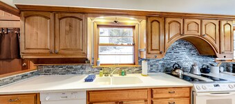 Dog-friendly and secluded lakefront gem with a full bar, private dock, and views