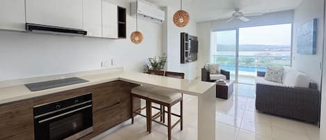 Departamento, 1 habitación | Cocina privada | Parrilla de estufa, utensilios de cocina y congelador