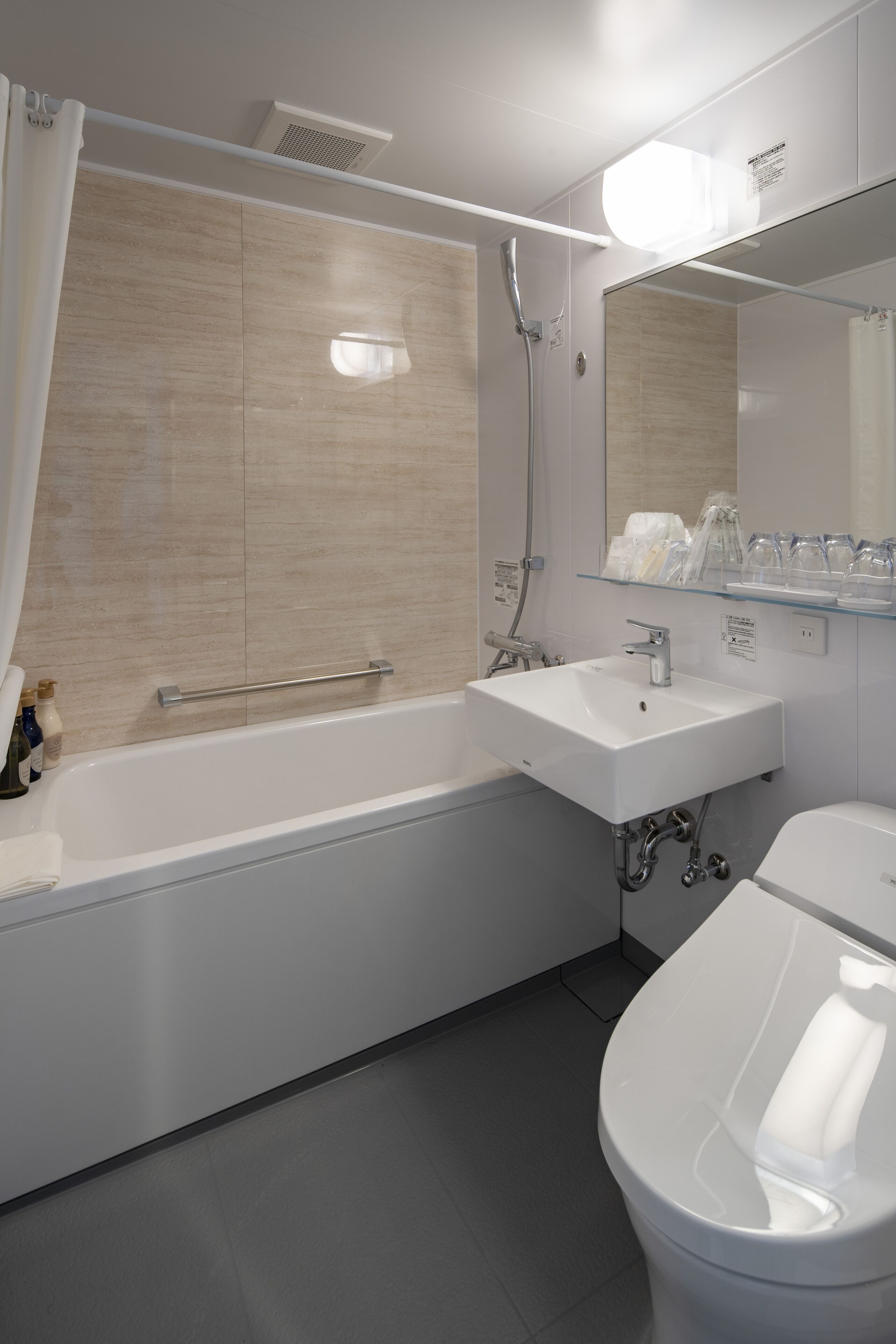 free toiletries, hair dryer, slippers, electronic bidet