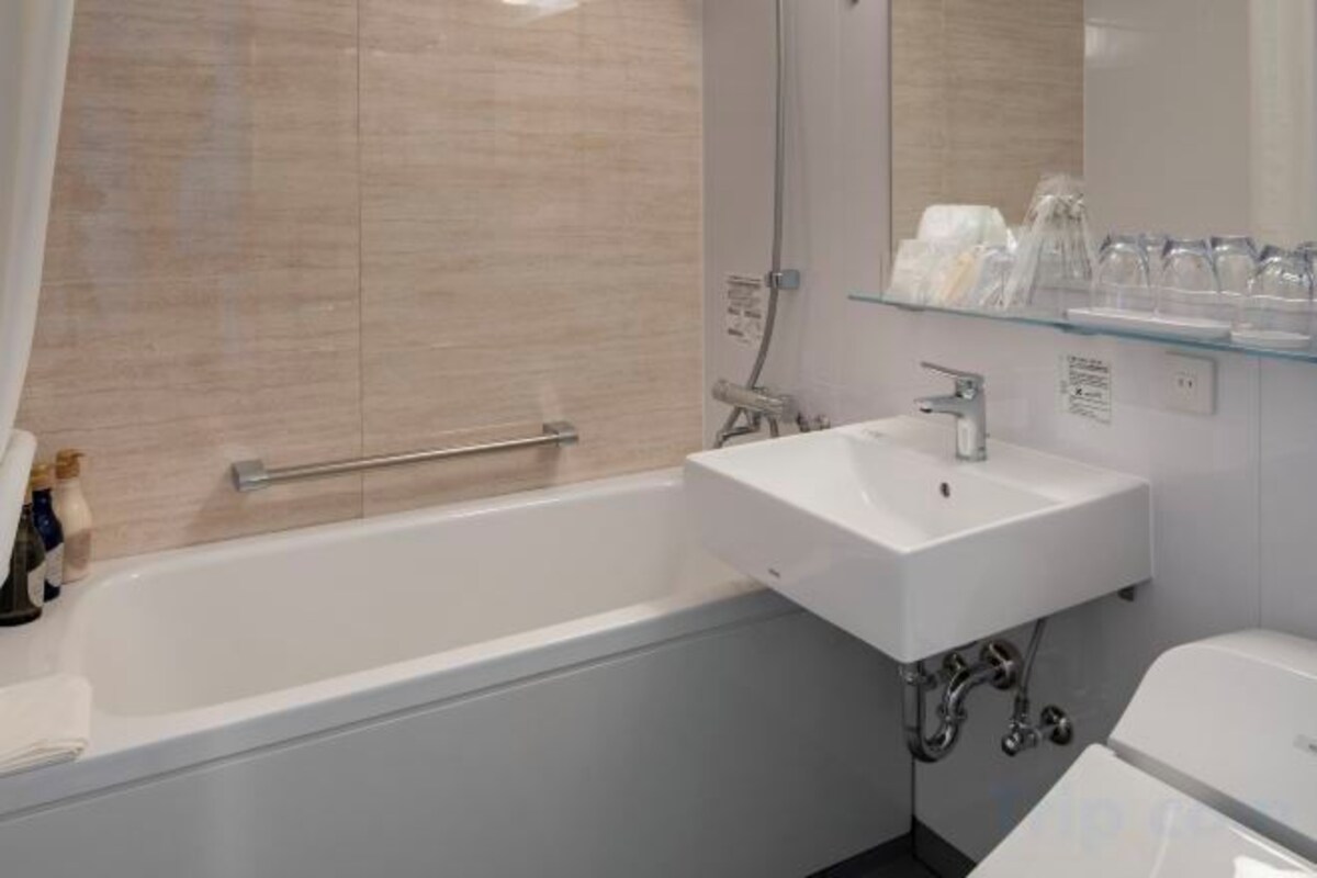 Free toiletries, hair dryer, slippers, electronic bidet