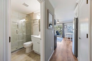 Shower, hair dryer, towels, toilet paper