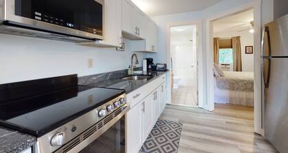 Open, ground-floor condo right in town with outdoor pool, BBQ