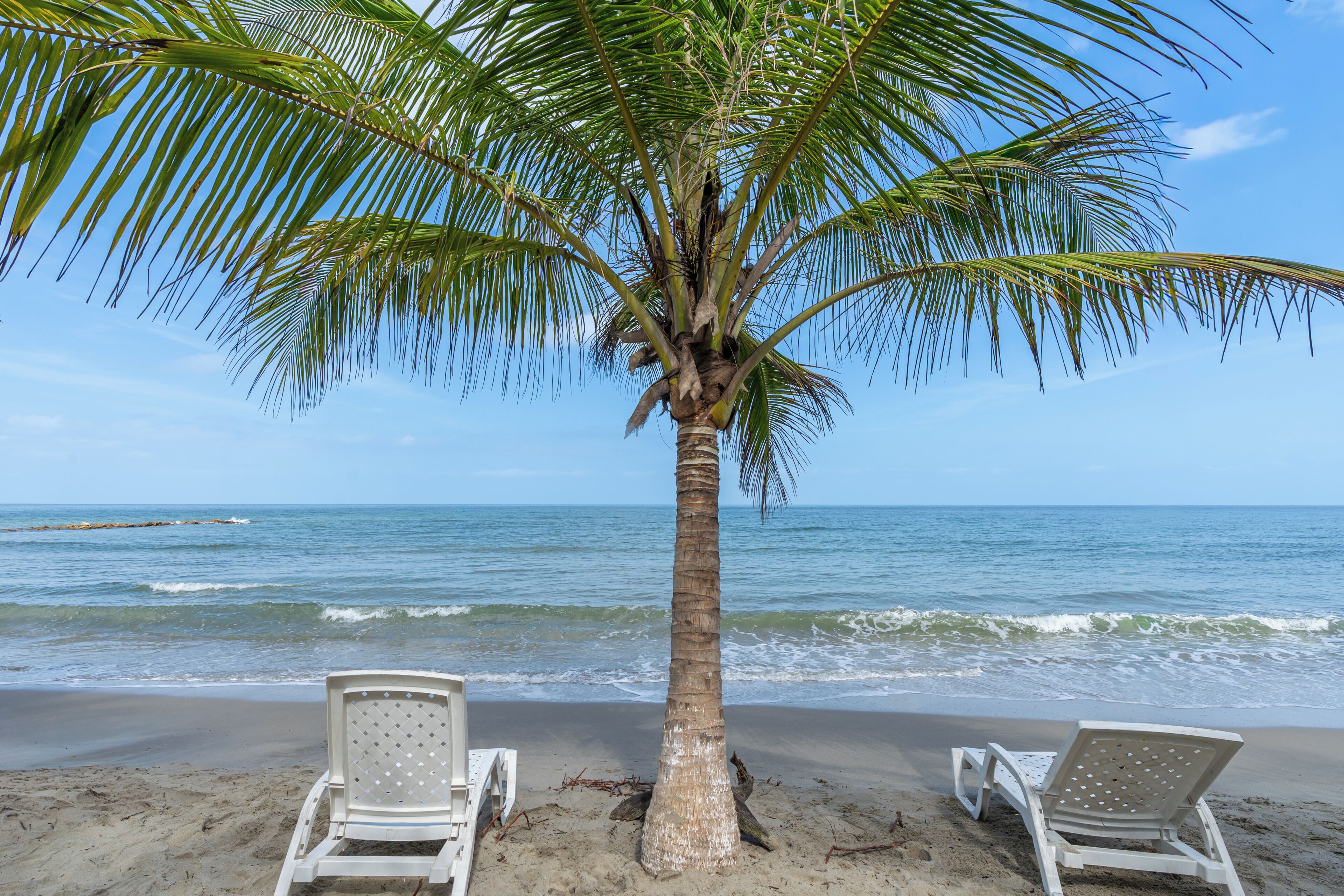 Private beach, beach umbrellas, beach volleyball