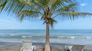 Private beach, beach umbrellas, beach volleyball