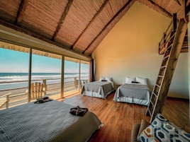 Quarto luxo, vista para o mar | Cortinas blackout, Wi-Fi de cortesia, roupa de cama