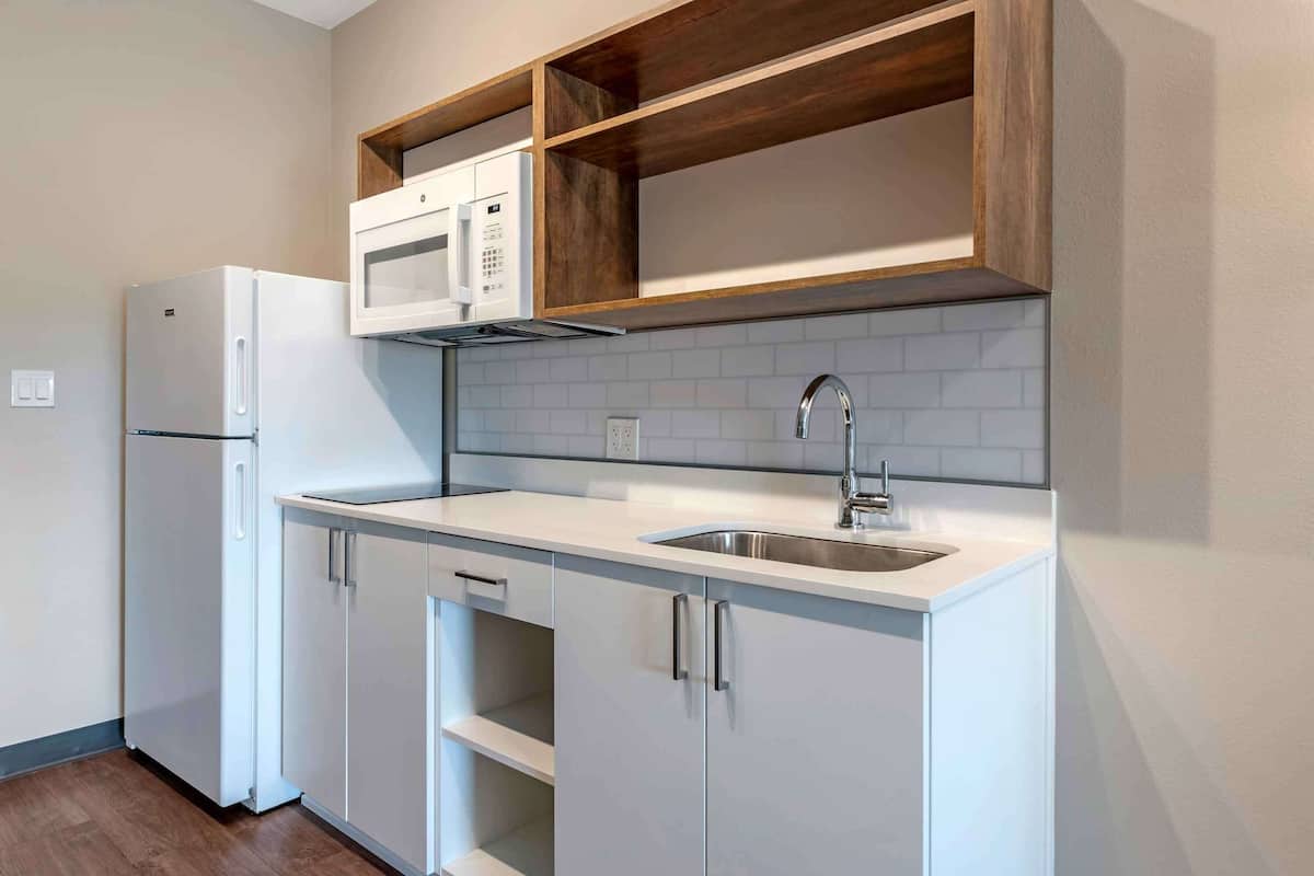 premium bedding, desk, laptop workspace, iron/ironing board