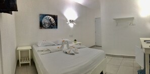 Basic Single Room, 1 Queen Bed | Individually furnished, blackout curtains, bed sheets - Bayahibe Hotel El Pulpo (San Rafael del Yuma)