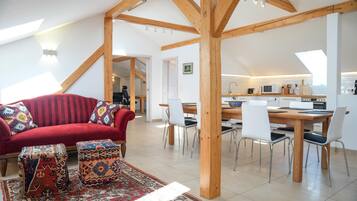 Senior Loft | Living area | Flat-screen TV