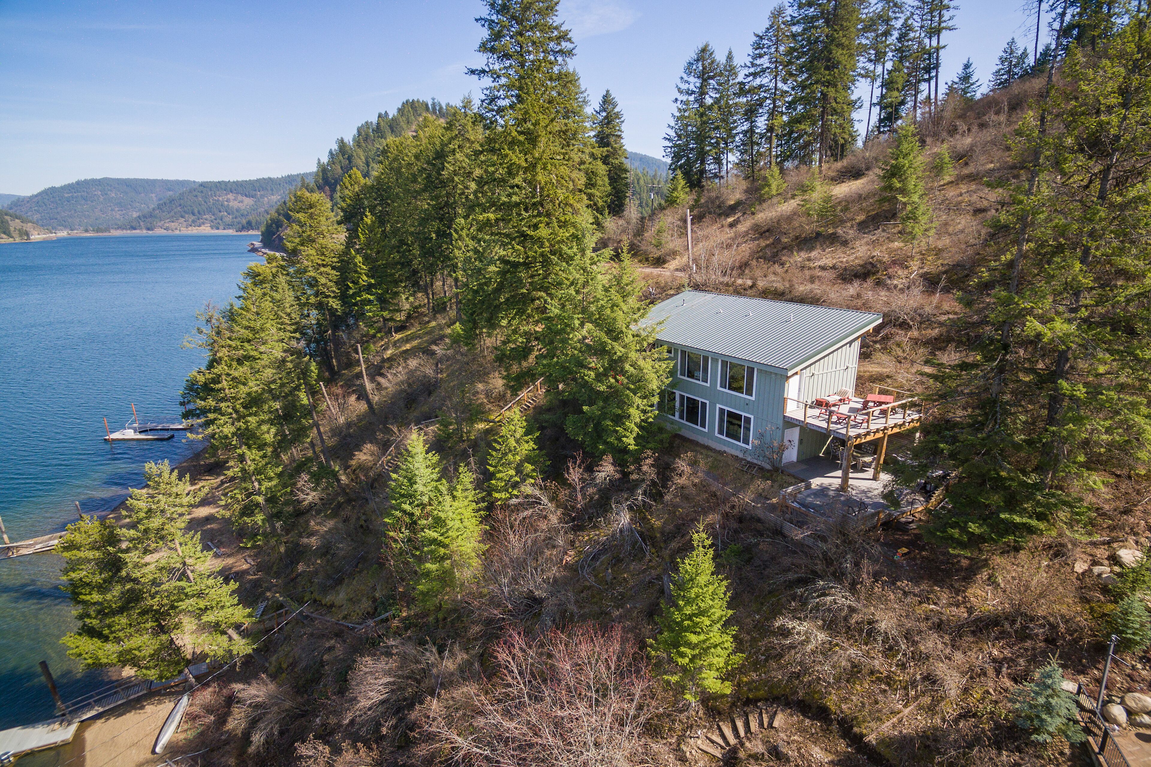 Two dog-friendly, lakefront homes with a private hot tub & decks