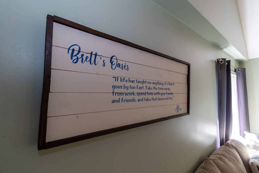 A framed quote on a wall.