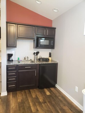 Fridge, microwave, stovetop, coffee/tea maker