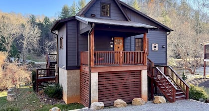 Take in the natural beauty from this elegant riverfront home