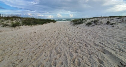 Updated & pet friendly! Short stroll to west public beach. Located at crosswalk.