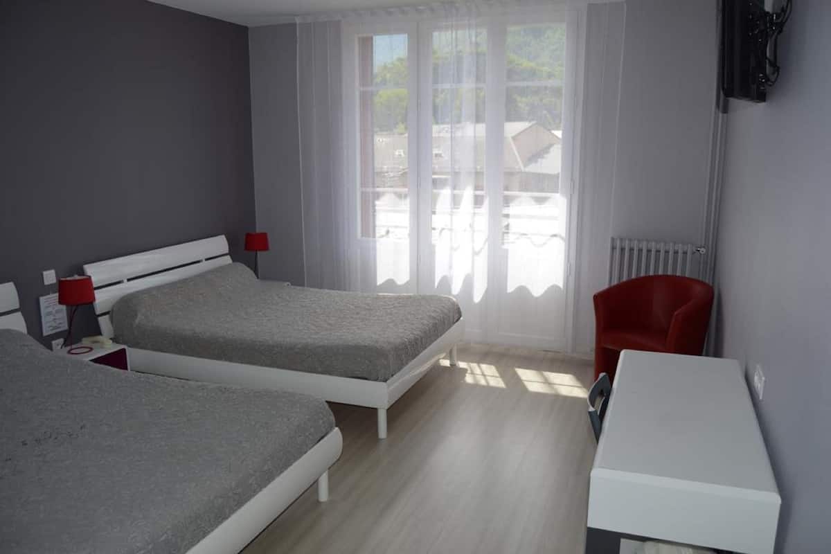 standard quadruple room | 1 bedroom, individually decorated, individually furnished, desk