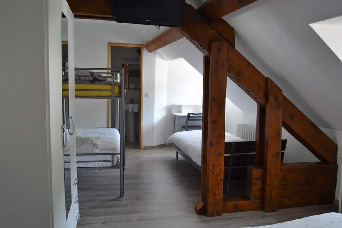 family room | 1 bedroom, individually decorated, individually furnished, desk