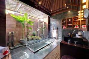 Separate tub and shower, rainfall showerhead, free toiletries - Majapahit Beach Villas by Nakula (Sukawati)