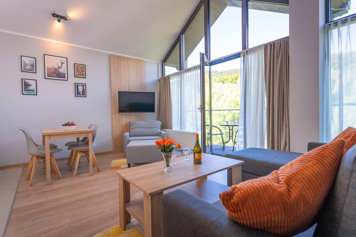 Apartamento Deluxe | Zona de estar